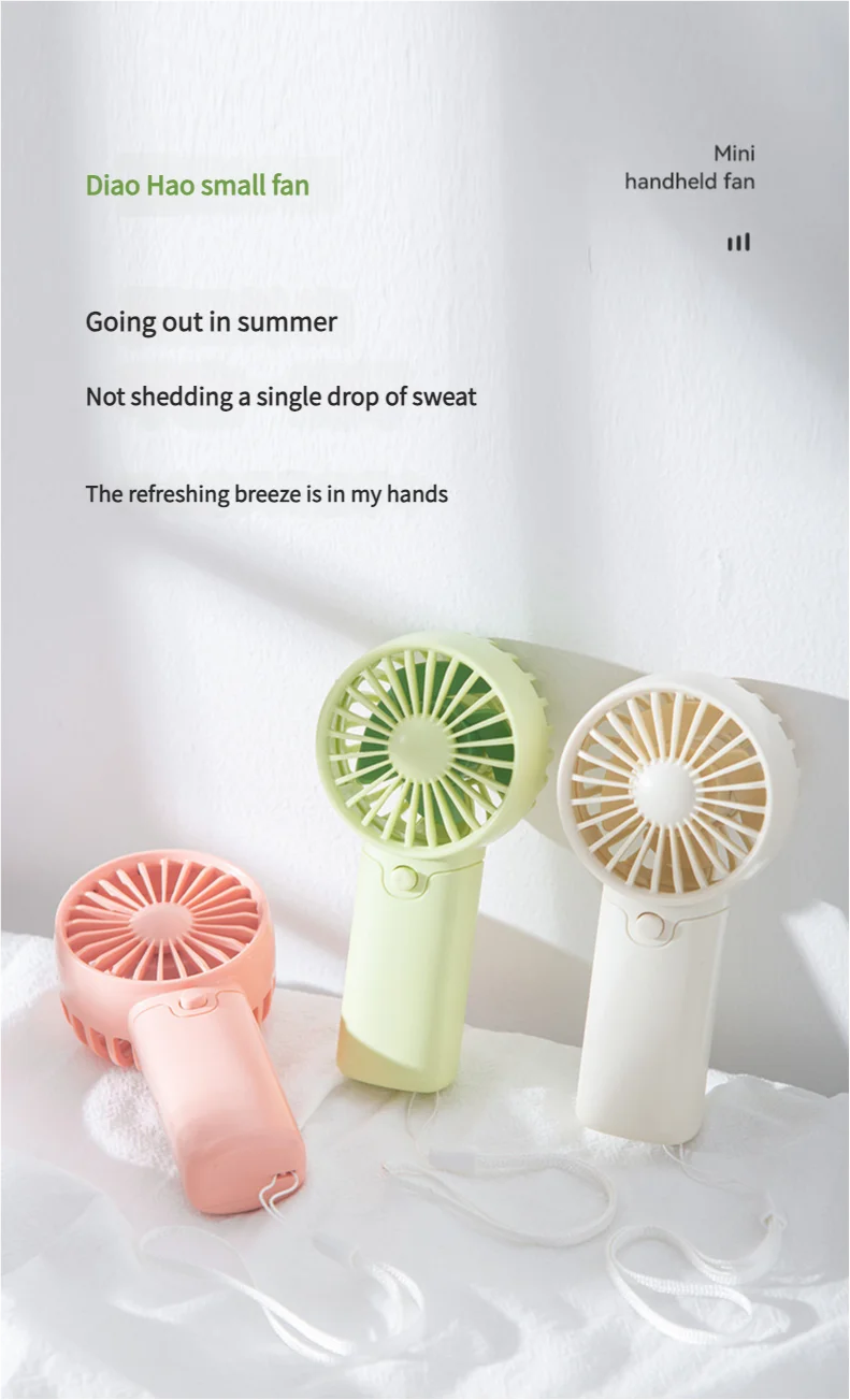 Mini Handheld Fan – Portable Personal Cooler for Summer